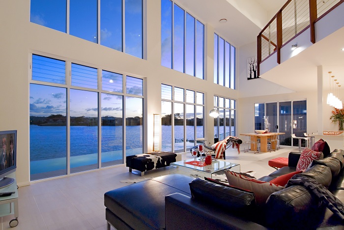 The perfect thing for south facing homes is massive windows to bring as much light in as possible. Just like this home in Twin Waters best rental properties