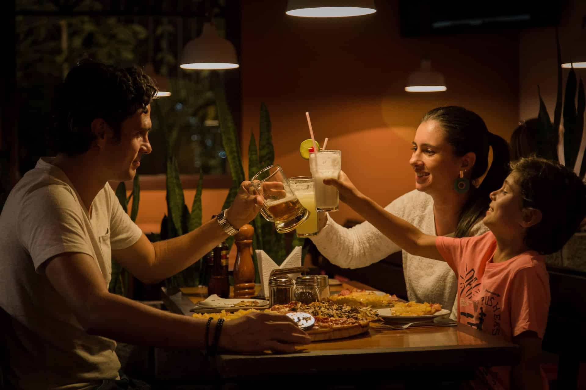 asset agents property management. This is a photo of a family of three having dinner at home