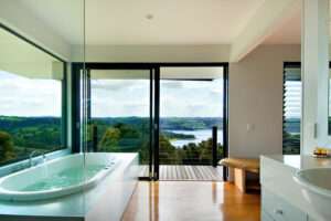 Real Estate Appraisal : A stylish bedroom with a bath and views on the Sunshine Coast