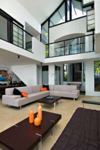 A modern living room featuring high ceilings on the Sunshine Coast.