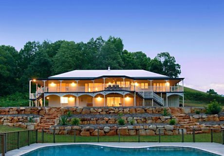 topsnap.com.au A charming and spacious house featuring a pool and expansive deck.
