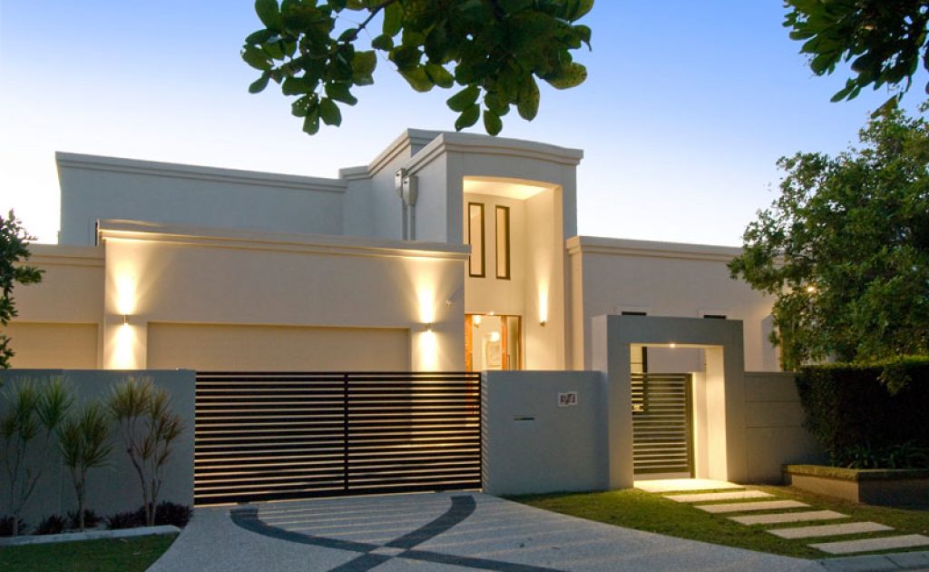 topsnap.com.au Modern home on the Sunshine Coast features a sleek white exterior and a stylish black gate